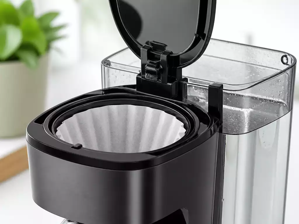 AIRMSEN coffee maker with a clean water reservoir and filter basket, ready for brewing